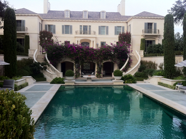 Boganvilla growing on house