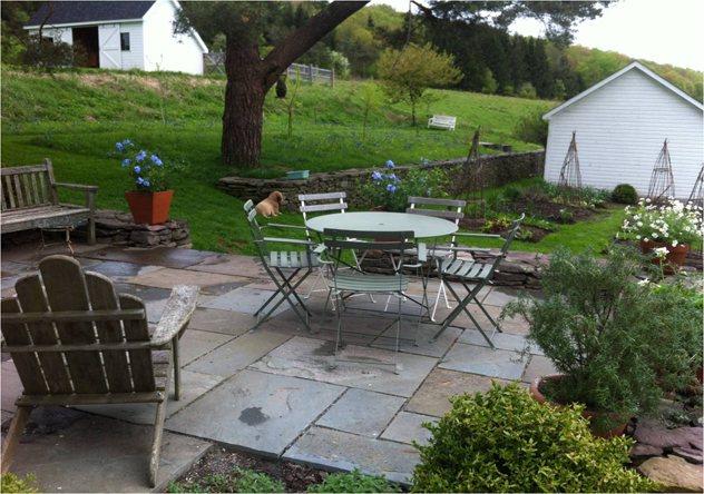 Patio relates to vegetable garden and out building