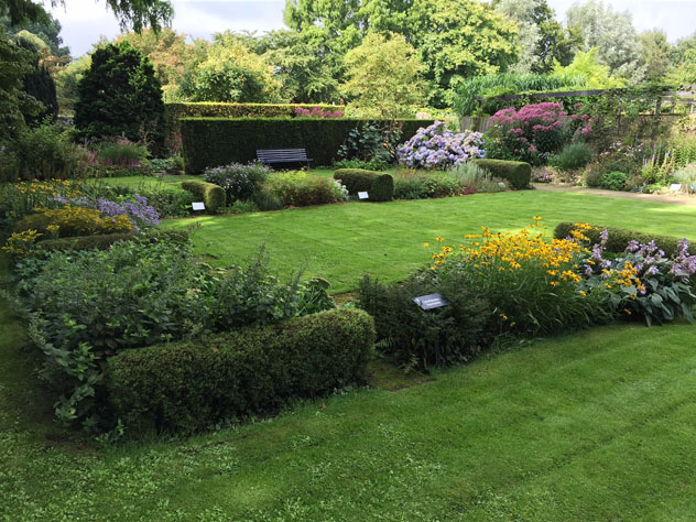Use of hedges create strong lines in the garden composition.